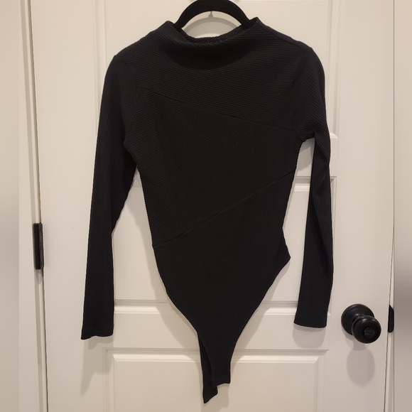 Pair of ribbed bodysuits - Picture 2 of 9